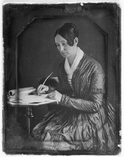 Unitarian Dorothea Dix c. 1848 crusader for mental health at her writing table. Photo: Marcus Aurelius